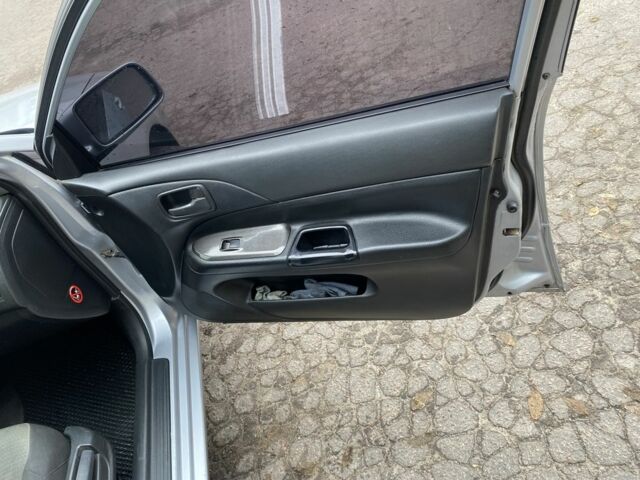 Серый Мицубиси Лансер, объемом двигателя 1.6 л и пробегом 380 тыс. км за 4000 $, фото 7 на Automoto.ua