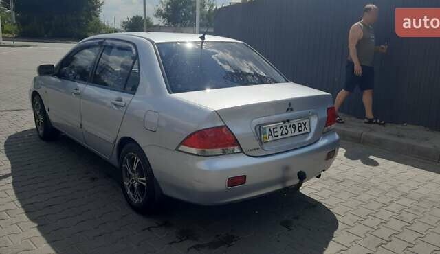 Серый Мицубиси Лансер, объемом двигателя 1.6 л и пробегом 420 тыс. км за 4900 $, фото 3 на Automoto.ua