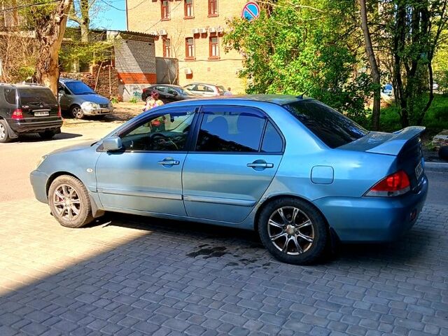 Сірий Міцубісі Lancer, об'ємом двигуна 1.6 л та пробігом 172 тис. км за 3500 $, фото 2 на Automoto.ua