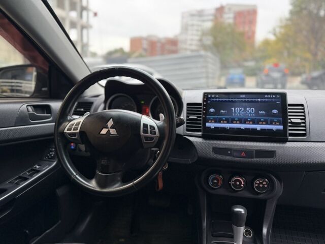 Сірий Міцубісі Lancer, об'ємом двигуна 2 л та пробігом 220 тис. км за 6400 $, фото 8 на Automoto.ua