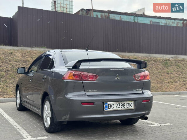 Сірий Міцубісі Lancer, об'ємом двигуна 2 л та пробігом 222 тис. км за 6300 $, фото 7 на Automoto.ua