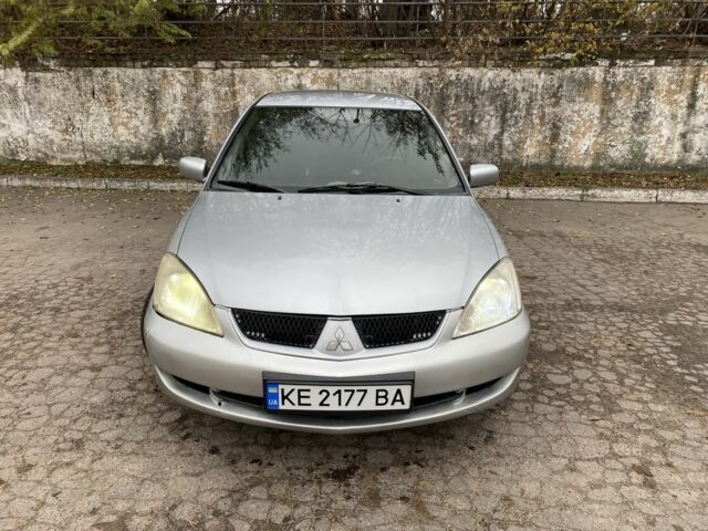 Серый Мицубиси Лансер, объемом двигателя 1.6 л и пробегом 380 тыс. км за 4000 $, фото 4 на Automoto.ua