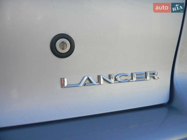 Сірий Міцубісі Lancer, об'ємом двигуна 2 л та пробігом 103 тис. км за 7300 $, фото 27 на Automoto.ua