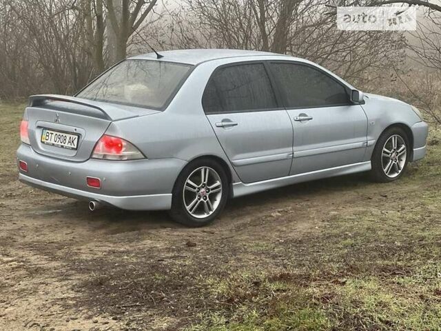 Сірий Міцубісі Lancer, об'ємом двигуна 2 л та пробігом 234 тис. км за 6000 $, фото 1 на Automoto.ua