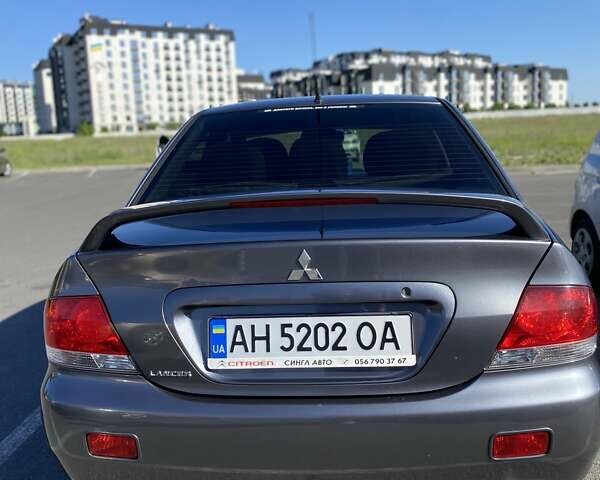 Сірий Міцубісі Lancer, об'ємом двигуна 1.6 л та пробігом 293 тис. км за 5000 $, фото 3 на Automoto.ua
