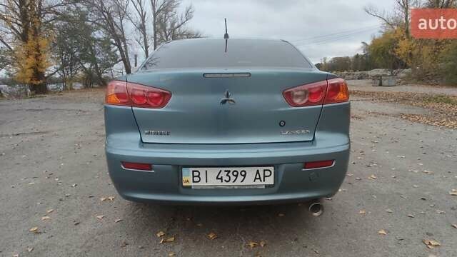 Сірий Міцубісі Lancer, об'ємом двигуна 2 л та пробігом 179 тис. км за 7700 $, фото 2 на Automoto.ua