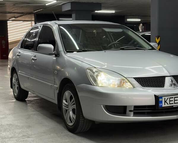 Серый Мицубиси Лансер, объемом двигателя 1.58 л и пробегом 271 тыс. км за 4200 $, фото 6 на Automoto.ua