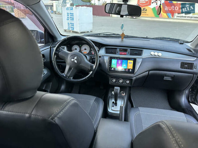 Сірий Міцубісі Lancer, об'ємом двигуна 1.6 л та пробігом 189 тис. км за 6200 $, фото 12 на Automoto.ua