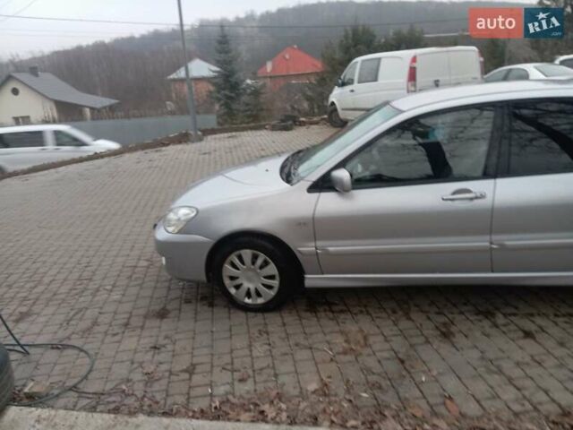 Серый Мицубиси Лансер, объемом двигателя 1.6 л и пробегом 175 тыс. км за 4200 $, фото 12 на Automoto.ua