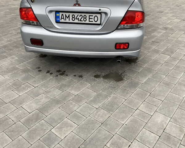 Серый Мицубиси Лансер, объемом двигателя 1.6 л и пробегом 263 тыс. км за 2350 $, фото 12 на Automoto.ua