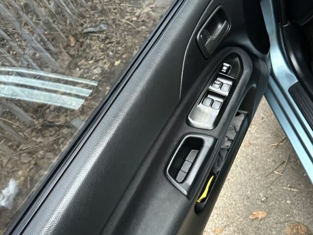 Серый Мицубиси Лансер, объемом двигателя 1.6 л и пробегом 238 тыс. км за 4300 $, фото 14 на Automoto.ua