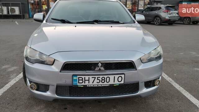 Серый Мицубиси Лансер, объемом двигателя 1.5 л и пробегом 201 тыс. км за 5600 $, фото 7 на Automoto.ua