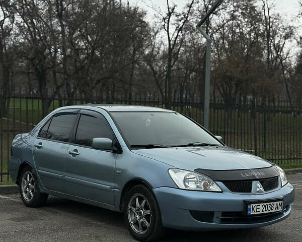 Серый Мицубиси Лансер, объемом двигателя 1.6 л и пробегом 238 тыс. км за 4400 $, фото 7 на Automoto.ua