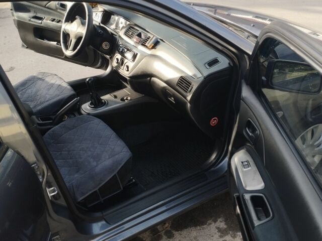 Сірий Міцубісі Lancer, об'ємом двигуна 1.6 л та пробігом 178 тис. км за 5464 $, фото 4 на Automoto.ua