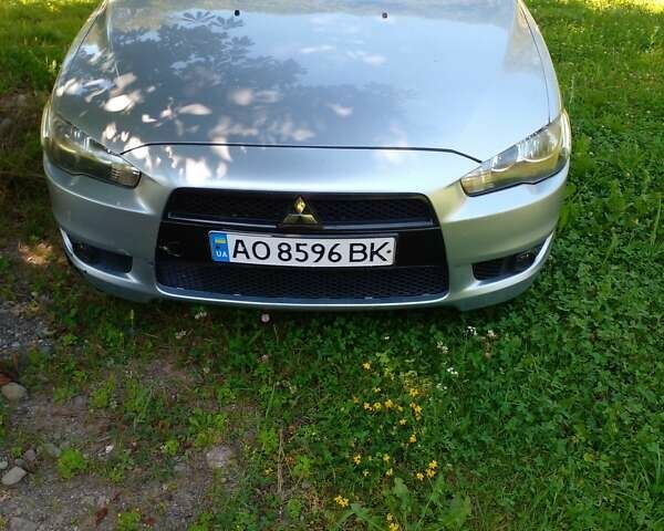 Серый Мицубиси Лансер, объемом двигателя 2 л и пробегом 160 тыс. км за 5300 $, фото 2 на Automoto.ua