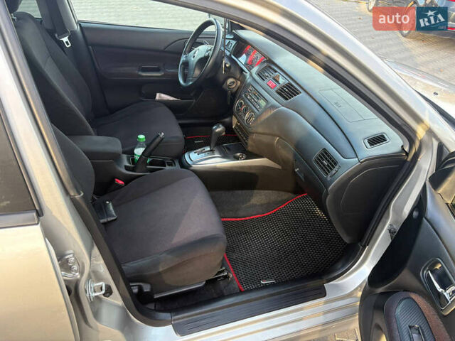 Сірий Міцубісі Lancer, об'ємом двигуна 2 л та пробігом 180 тис. км за 4000 $, фото 13 на Automoto.ua