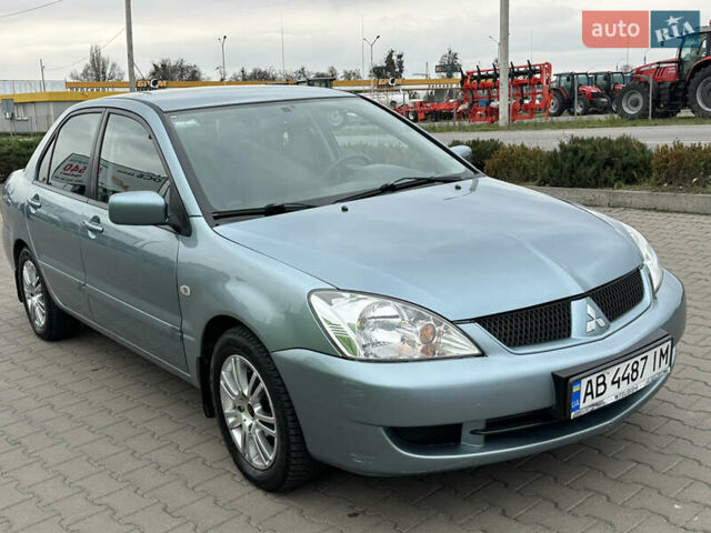 Сірий Міцубісі Lancer, об'ємом двигуна 1.6 л та пробігом 116 тис. км за 5199 $, фото 11 на Automoto.ua