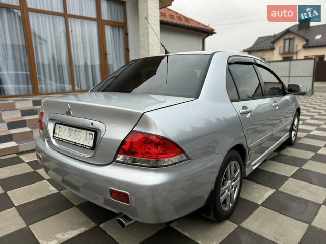 Сірий Міцубісі Lancer, об'ємом двигуна 1.6 л та пробігом 281 тис. км за 3999 $, фото 9 на Automoto.ua