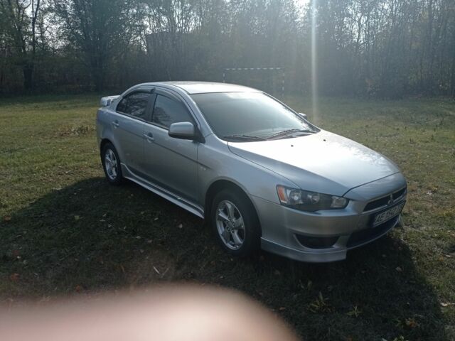 Серый Мицубиси Лансер, объемом двигателя 2 л и пробегом 180 тыс. км за 5800 $, фото 1 на Automoto.ua