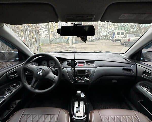 Серый Мицубиси Лансер, объемом двигателя 1.6 л и пробегом 238 тыс. км за 4400 $, фото 17 на Automoto.ua