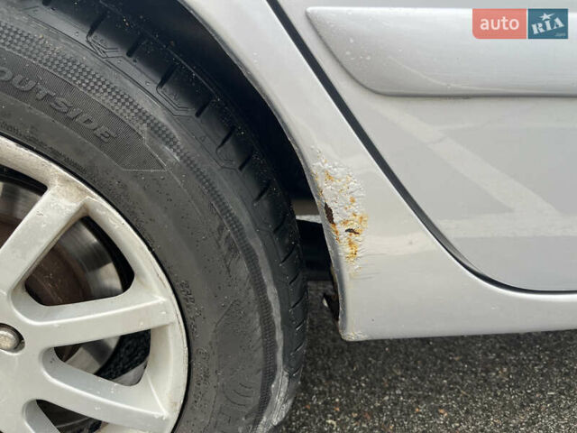 Серый Мицубиси Лансер, объемом двигателя 1.58 л и пробегом 232 тыс. км за 4900 $, фото 16 на Automoto.ua