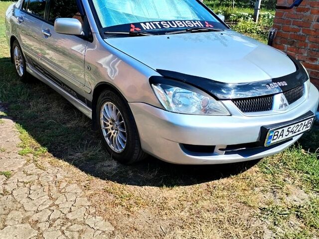 Сірий Міцубісі Lancer, об'ємом двигуна 1.6 л та пробігом 280 тис. км за 4800 $, фото 7 на Automoto.ua