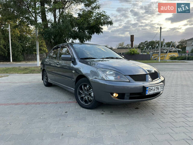 Сірий Міцубісі Lancer, об'ємом двигуна 1.6 л та пробігом 189 тис. км за 6200 $, фото 6 на Automoto.ua