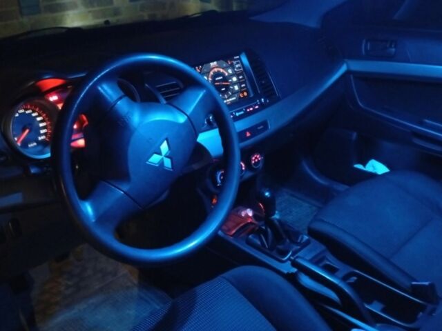 Серый Мицубиси Лансер, объемом двигателя 1.5 л и пробегом 215 тыс. км за 4999 $, фото 3 на Automoto.ua