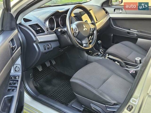 Серый Мицубиси Лансер, объемом двигателя 2 л и пробегом 282 тыс. км за 5450 $, фото 43 на Automoto.ua