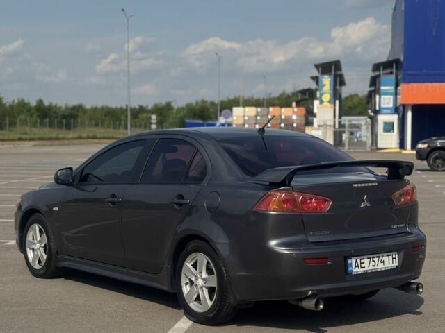 Сірий Міцубісі Lancer, об'ємом двигуна 2 л та пробігом 220 тис. км за 6600 $, фото 2 на Automoto.ua