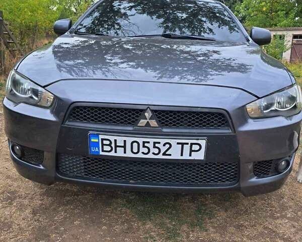 Серый Мицубиси Лансер, объемом двигателя 2 л и пробегом 215 тыс. км за 7300 $, фото 3 на Automoto.ua