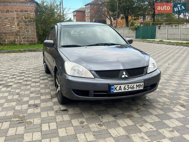 Міцубісі Lancer 2007 у Белой Церкве на Automoto.ua Сірий Міцубісі Lancer, об'ємом двигуна 1.58 л та пробігом 254 тис. км за 3200 $, фото 5 на Automoto.ua