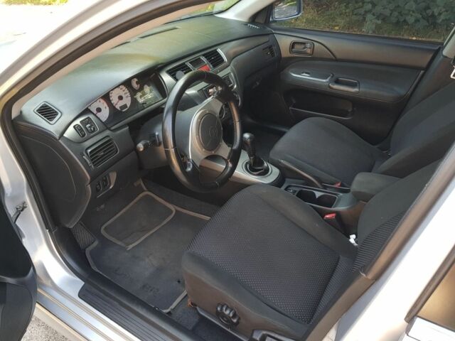 Сірий Міцубісі Lancer, об'ємом двигуна 1.6 л та пробігом 340 тис. км за 3250 $, фото 9 на Automoto.ua