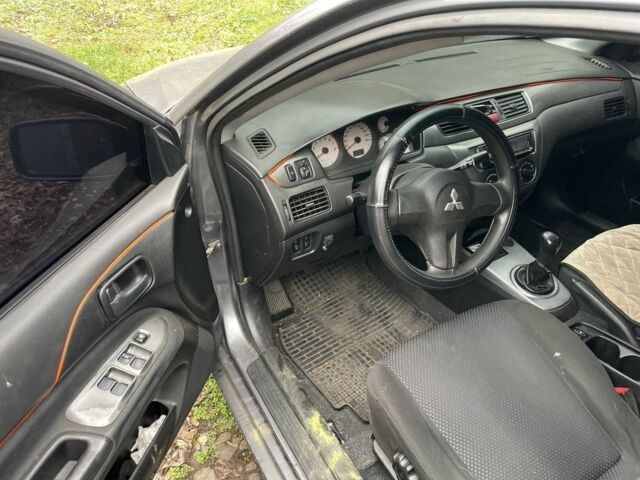 Сірий Міцубісі Lancer, об'ємом двигуна 1.6 л та пробігом 290 тис. км за 3600 $, фото 3 на Automoto.ua