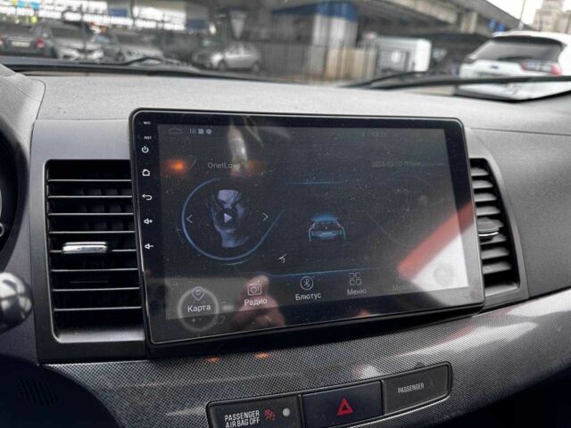 Сірий Міцубісі Lancer, об'ємом двигуна 2 л та пробігом 150 тис. км за 6700 $, фото 16 на Automoto.ua