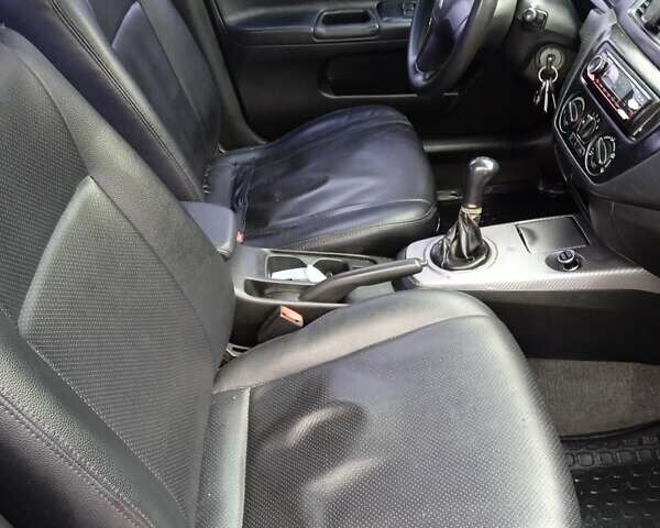 Сірий Міцубісі Lancer, об'ємом двигуна 1.6 л та пробігом 337 тис. км за 4600 $, фото 10 на Automoto.ua