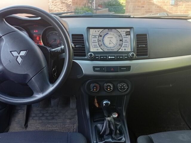 Серый Мицубиси Лансер, объемом двигателя 1.5 л и пробегом 215 тыс. км за 4999 $, фото 7 на Automoto.ua