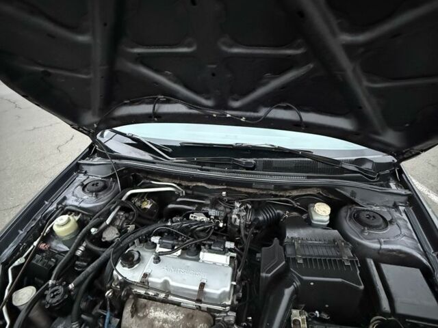 Серый Мицубиси Лансер, объемом двигателя 1.6 л и пробегом 350 тыс. км за 2850 $, фото 1 на Automoto.ua