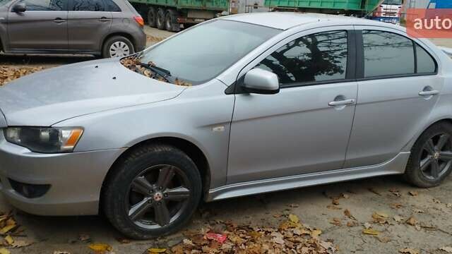 Серый Мицубиси Лансер, объемом двигателя 2 л и пробегом 305 тыс. км за 6300 $, фото 2 на Automoto.ua