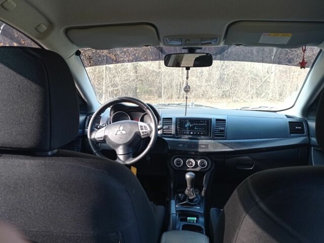 Серый Мицубиси Лансер, объемом двигателя 2 л и пробегом 180 тыс. км за 5800 $, фото 11 на Automoto.ua