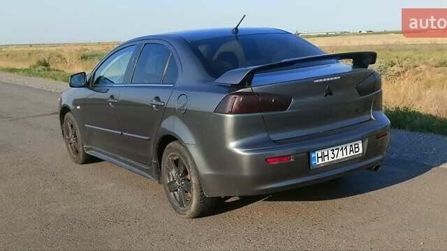 Сірий Міцубісі Lancer, об'ємом двигуна 2 л та пробігом 240 тис. км за 9500 $, фото 8 на Automoto.ua