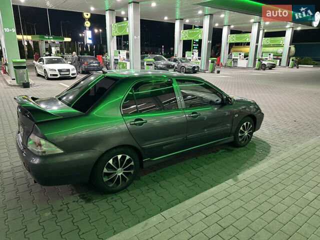 Серый Мицубиси Лансер, объемом двигателя 1.6 л и пробегом 112 тыс. км за 2800 $, фото 7 на Automoto.ua