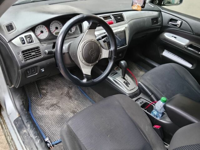 Серый Мицубиси Лансер, объемом двигателя 2 л и пробегом 495 тыс. км за 2800 $, фото 5 на Automoto.ua