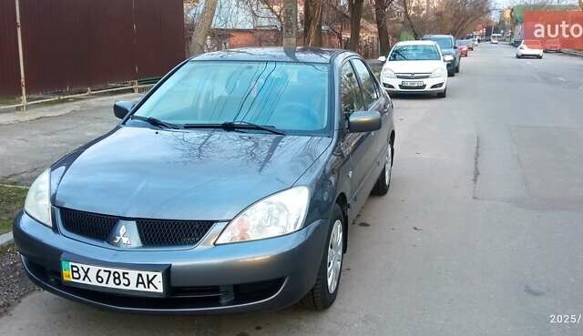 Міцубісі Lancer 2007 у Хмельницькому на Automoto.ua Сірий Міцубісі Lancer, об'ємом двигуна 1.58 л та пробігом 143 тис. км за 4100 $, фото 1 на Automoto.ua