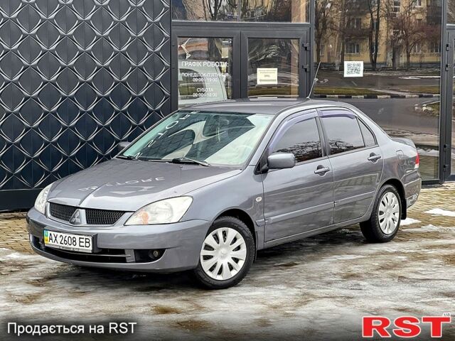 Сірий Міцубісі Lancer, об'ємом двигуна 1.6 л та пробігом 152 тис. км за 5700 $, фото 1 на Automoto.ua