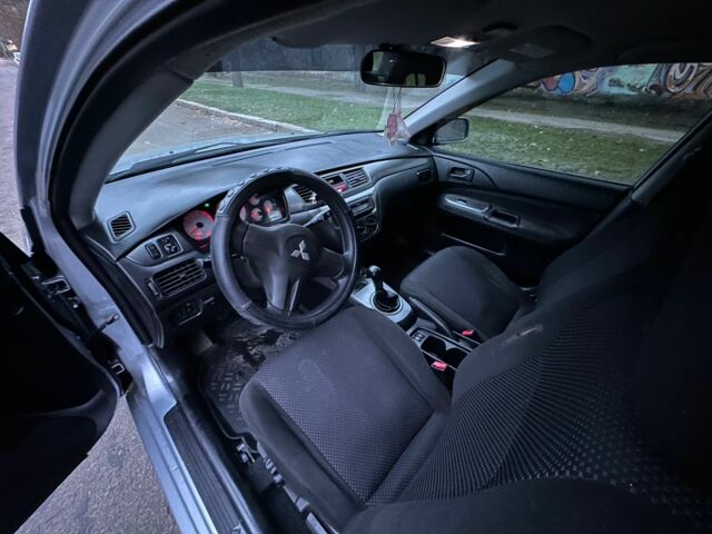 Сірий Міцубісі Lancer, об'ємом двигуна 1.6 л та пробігом 210 тис. км за 4750 $, фото 8 на Automoto.ua