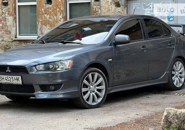 Сірий Міцубісі Lancer, об'ємом двигуна 2 л та пробігом 195 тис. км за 7600 $, фото 3 на Automoto.ua