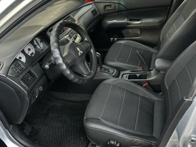 Сірий Міцубісі Lancer, об'ємом двигуна 1.6 л та пробігом 200 тис. км за 3900 $, фото 8 на Automoto.ua