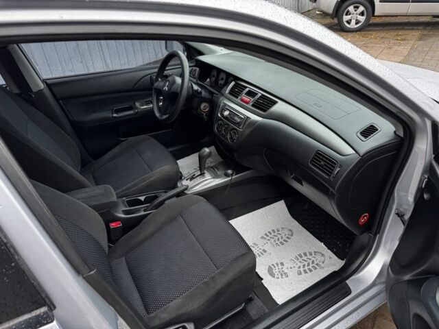 Серый Мицубиси Лансер, объемом двигателя 1.6 л и пробегом 205 тыс. км за 5300 $, фото 11 на Automoto.ua