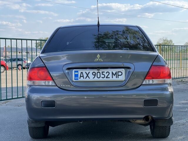 Сірий Міцубісі Lancer, об'ємом двигуна 0.16 л та пробігом 250 тис. км за 4350 $, фото 19 на Automoto.ua